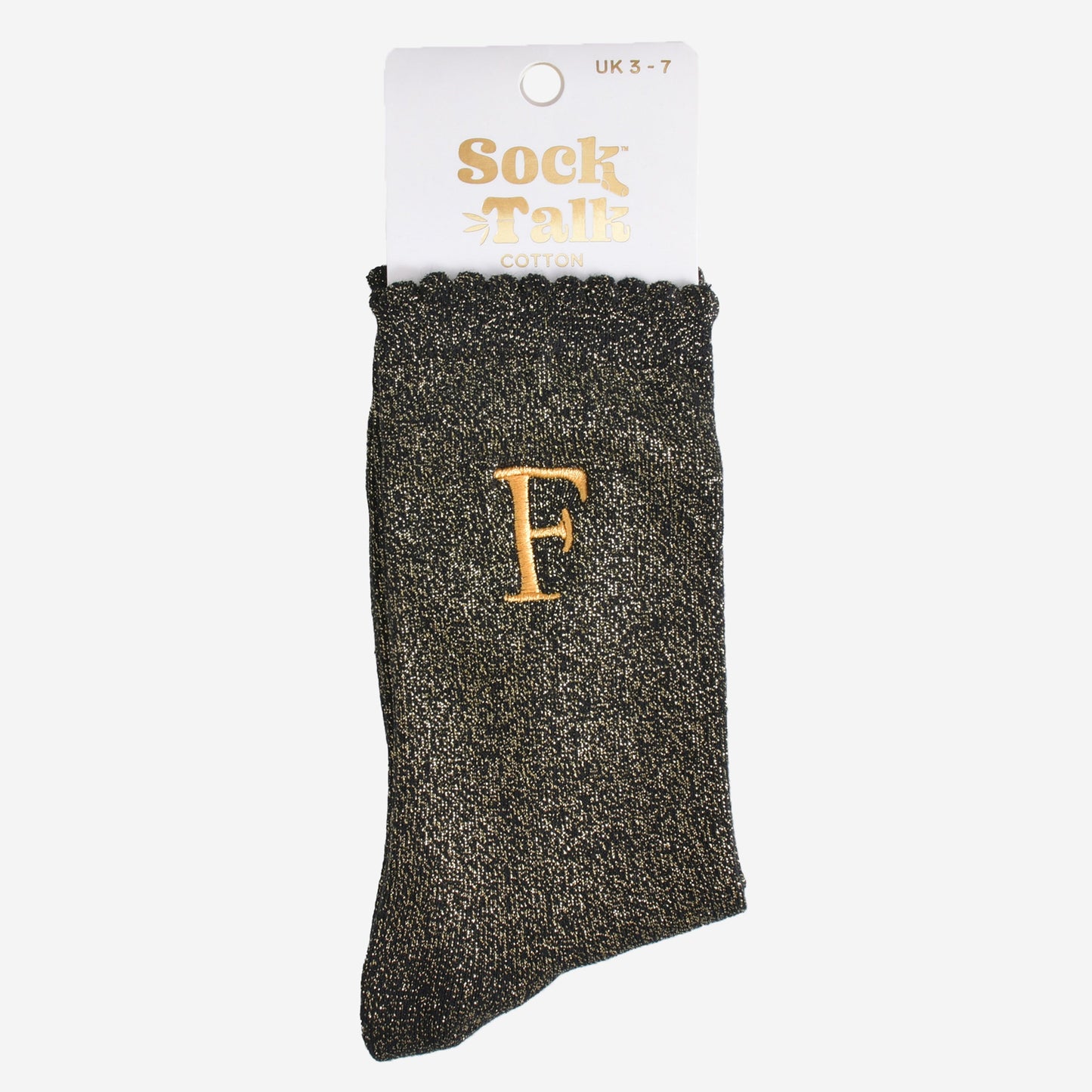 embroidered glitter letter f cotton ankle socks in their sock talk packaging, the socks are a uk size 3-7