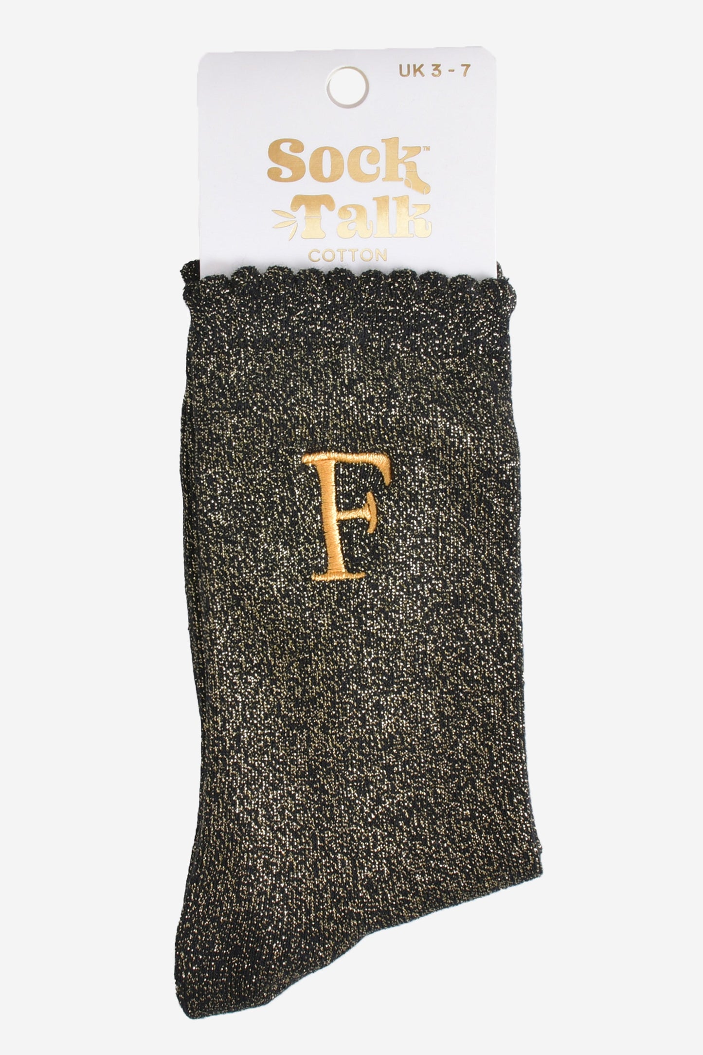 embroidered glitter letter f cotton ankle socks in their sock talk packaging, the socks are a uk size 3-7