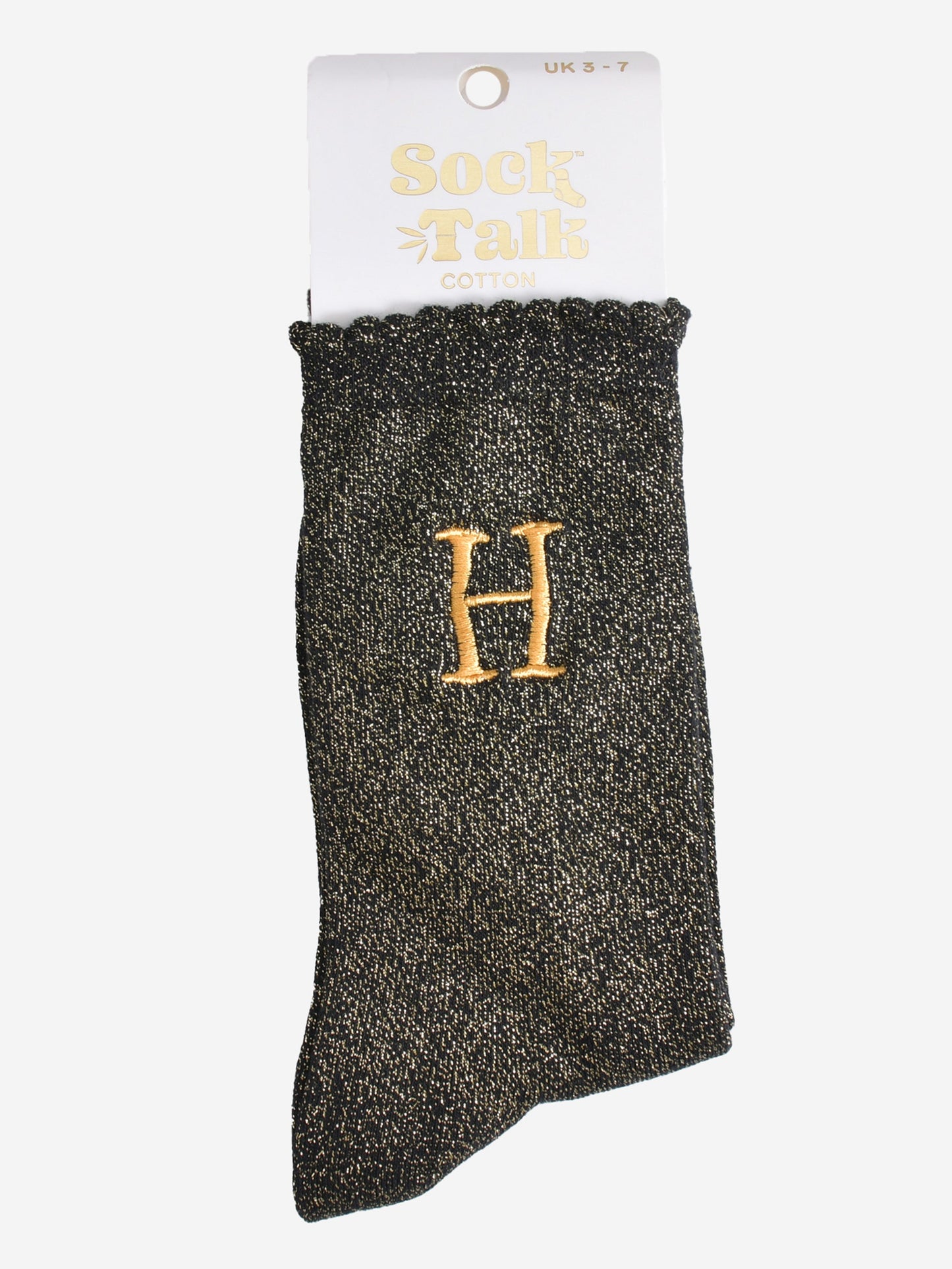 embroidered glitter letter h cotton ankle socks in their sock talk packaging, the socks are a uk size 3-7