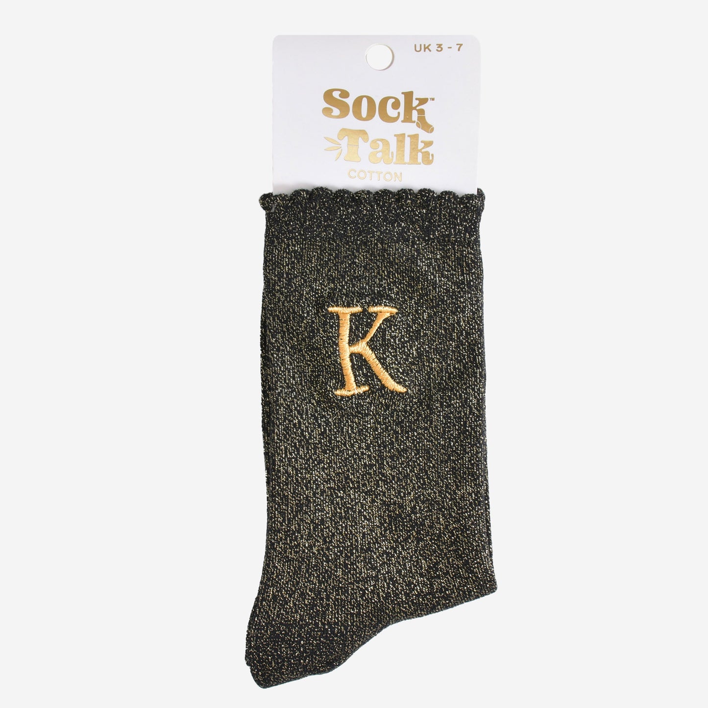 embroidered glitter letter k cotton ankle socks in their sock talk packaging, the socks are a uk size 3-7
