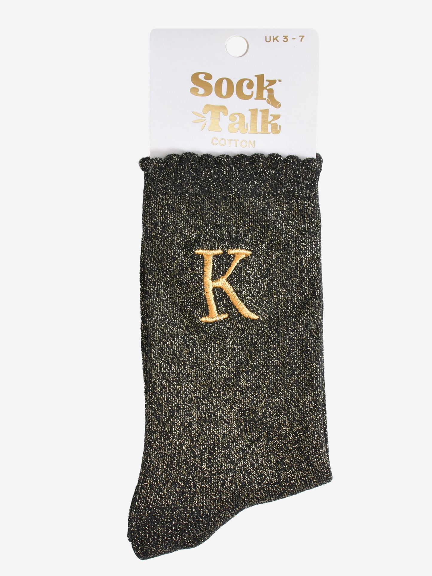 embroidered glitter letter k cotton ankle socks in their sock talk packaging, the socks are a uk size 3-7