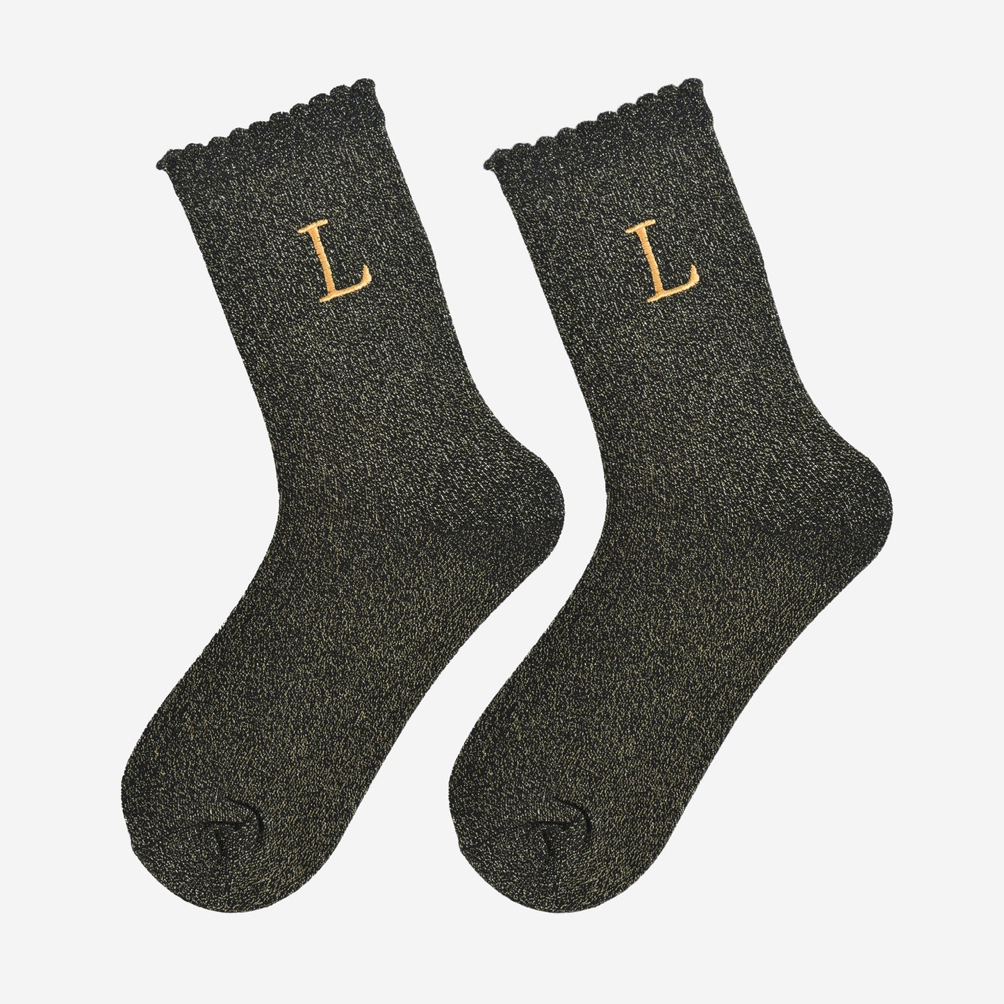 showing the glitter socks laying flat, they have a scalloped cuff and an all over gold sparkle