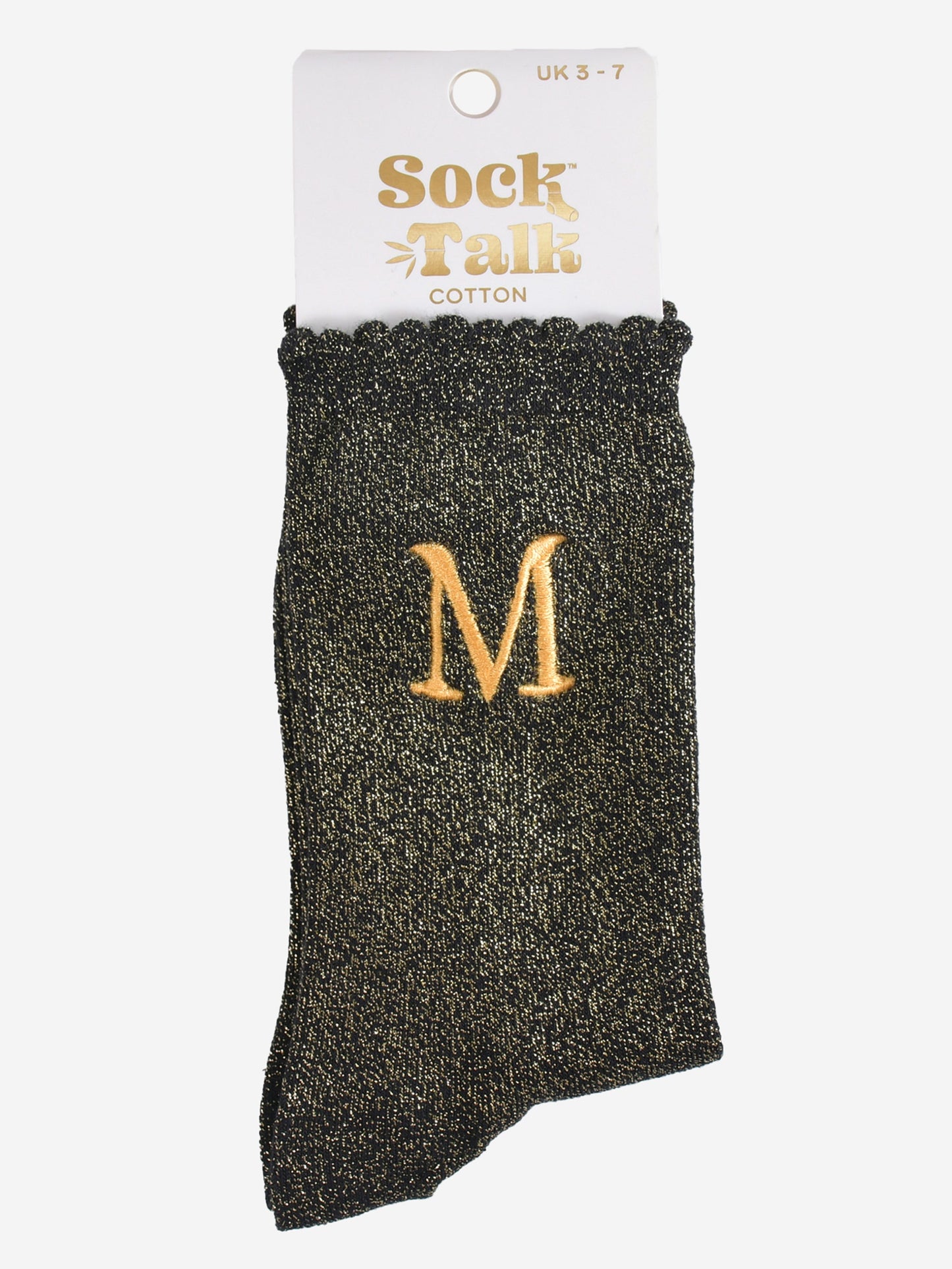 embroidered glitter letter m cotton ankle socks in their sock talk packaging, the socks are a uk size 3-7