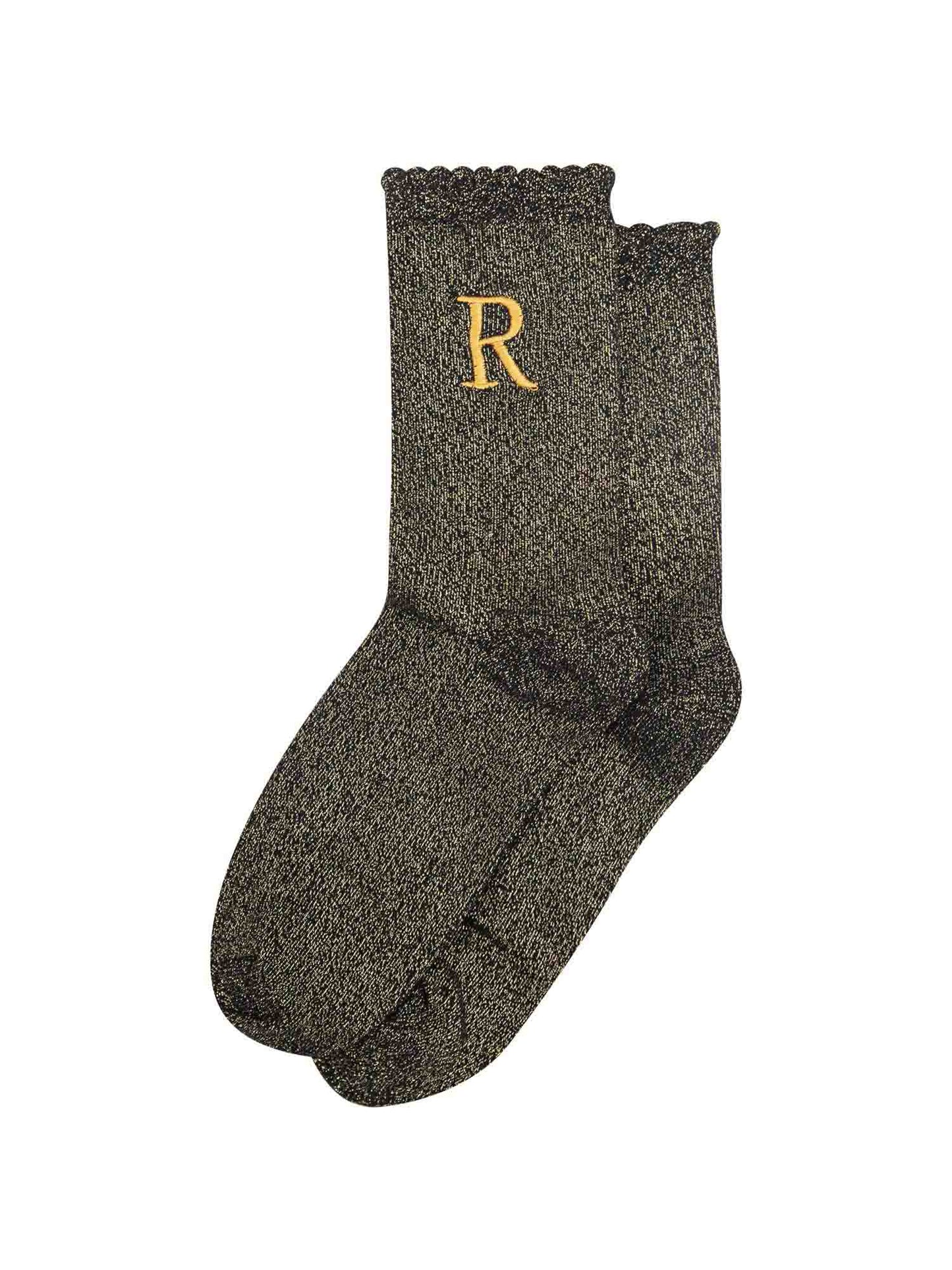 showing the glitter socks laying flat, they have a scalloped cuff and an all over gold sparkle
