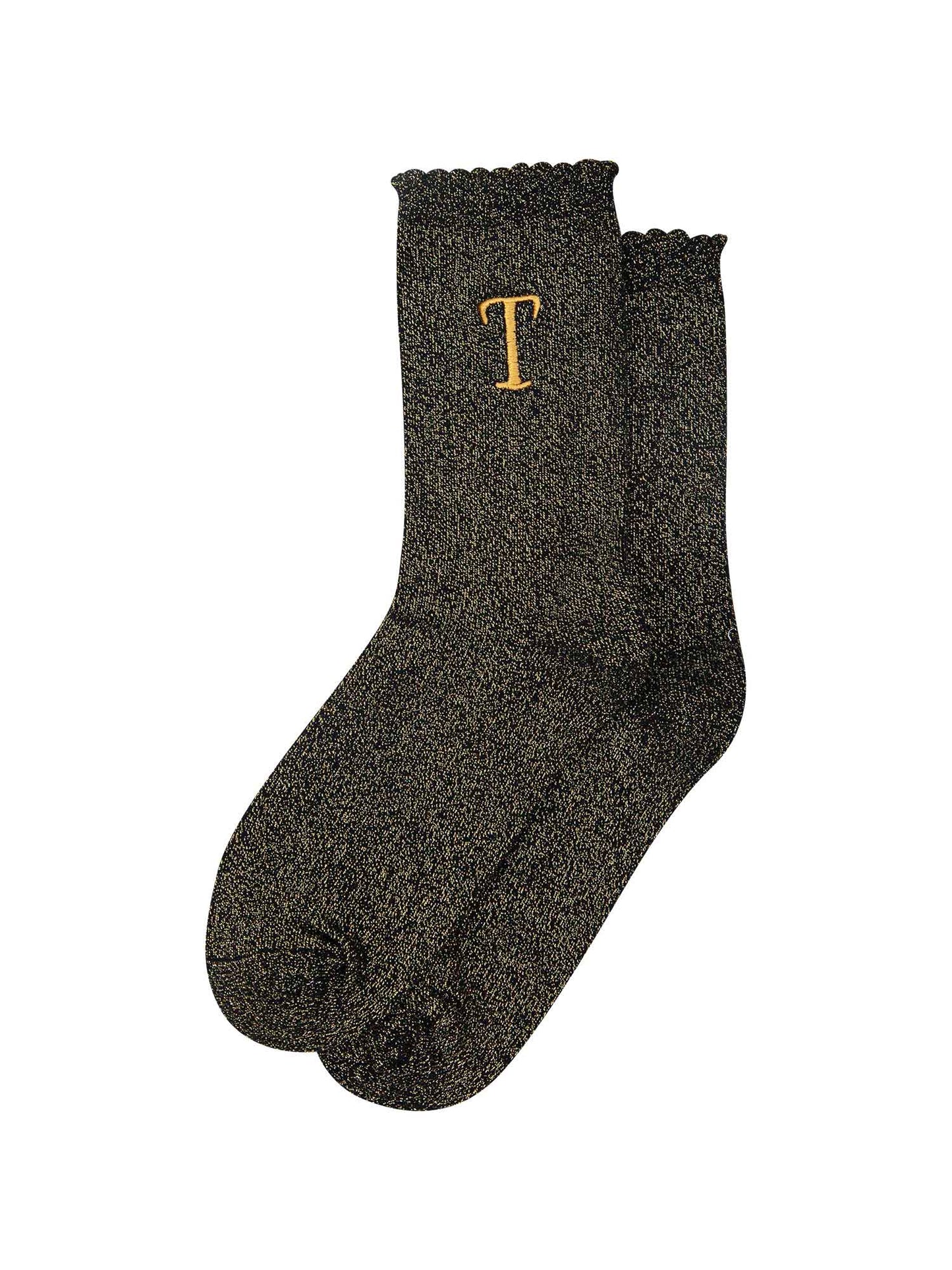 showing the glitter socks laying flat, they have a scalloped cuff and an all over gold sparkle