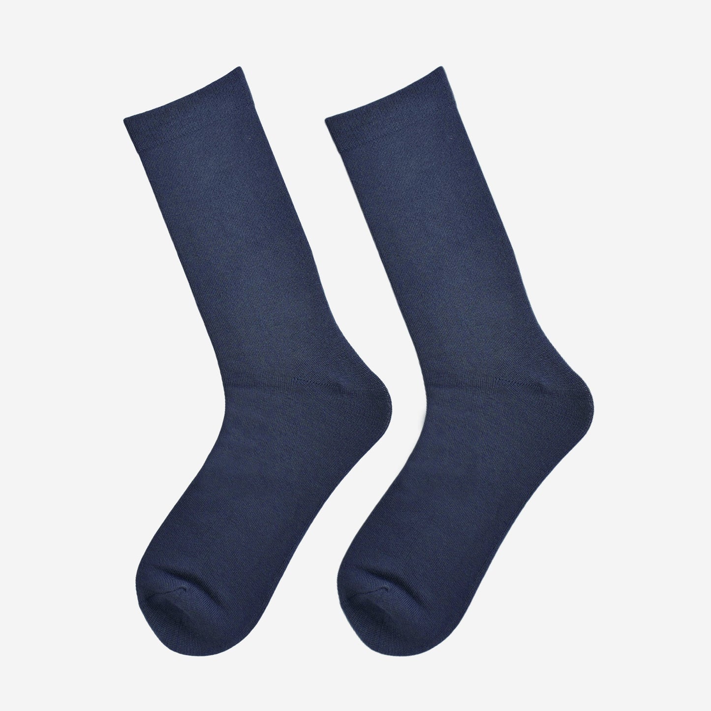 navy blue bamboo socks laying flat, showing the all over consistent colour