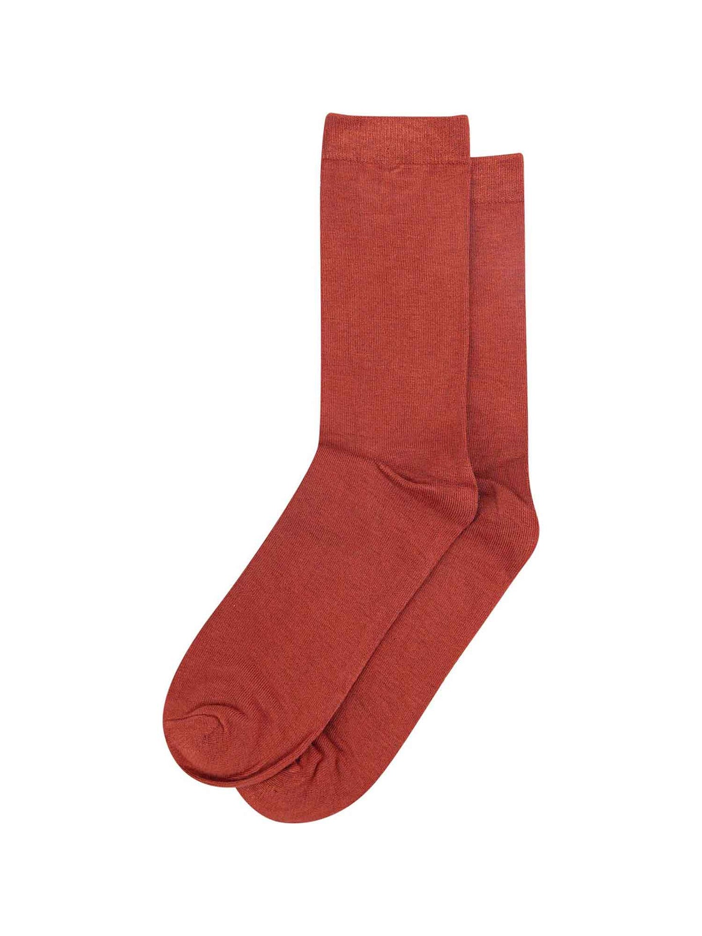 rust orange bamboo socks laying flat, showing the all over consistent colour