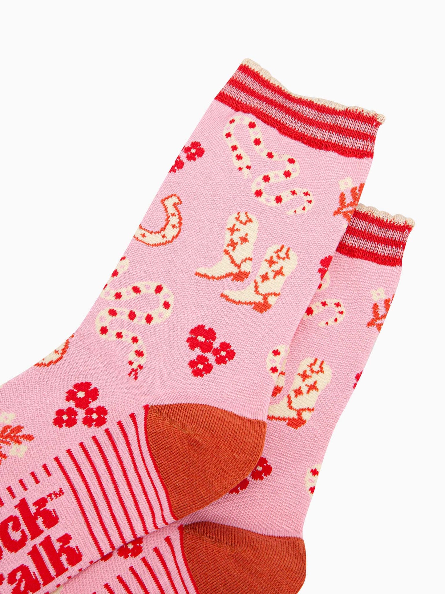 womens-bamboo-socks-pink-western-cowgirl-snakes-close-up-white-cowboy-boots-winding-rattle-snakes-red-desert-flowers-all-on-pink-background