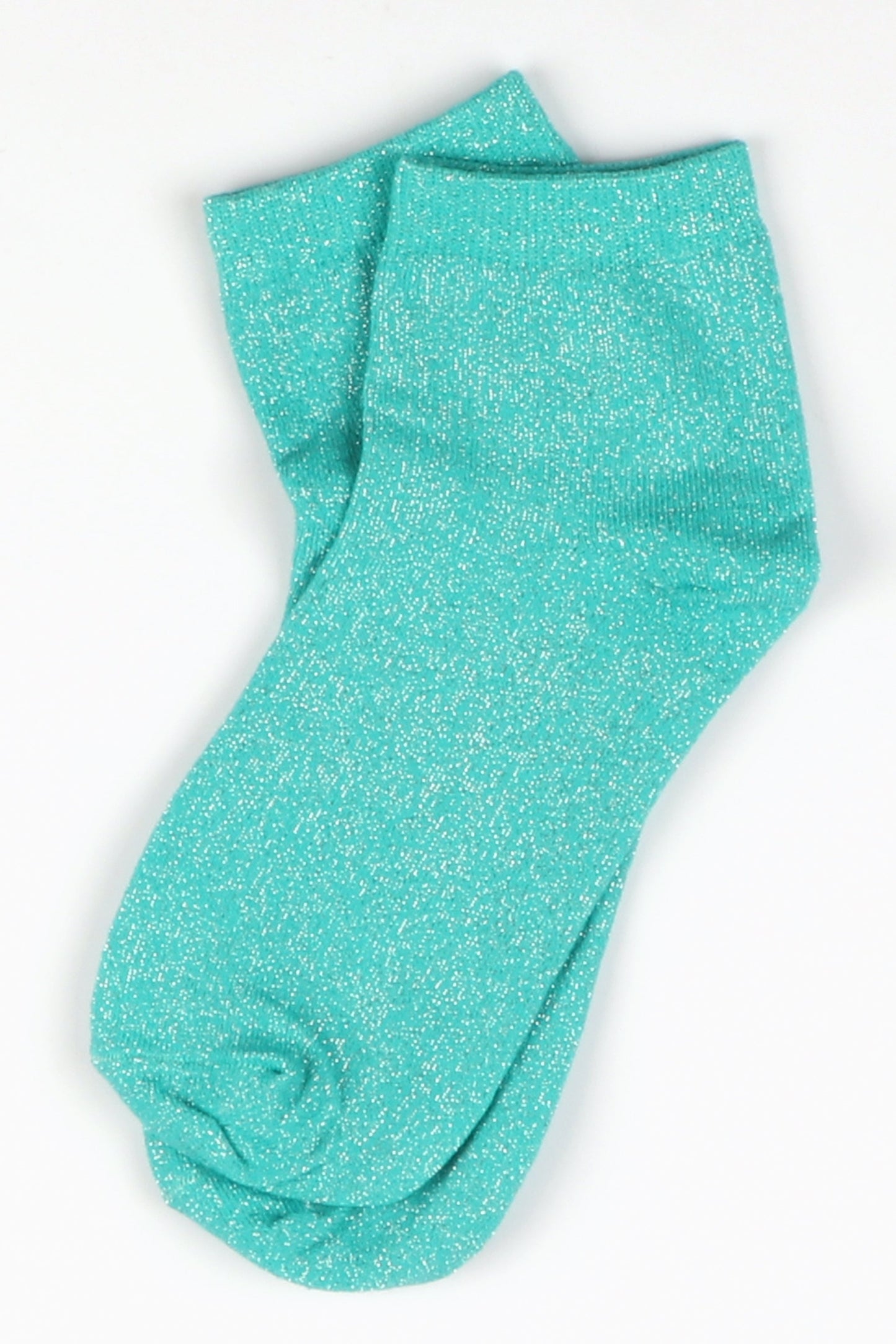 close up of the sparkly glitter effect on the turquoise anklet socks