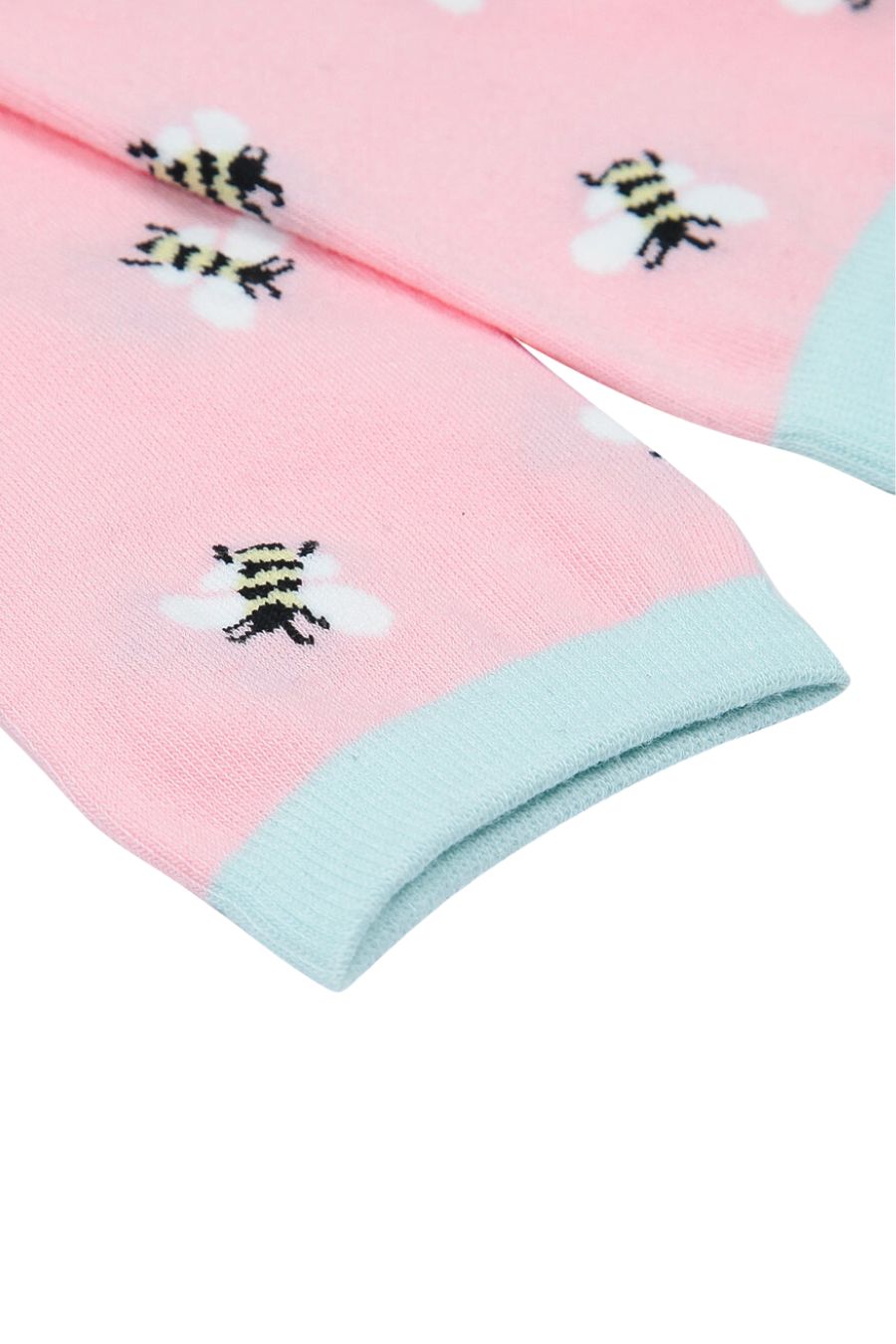 close up of the bee print and the mint green trim