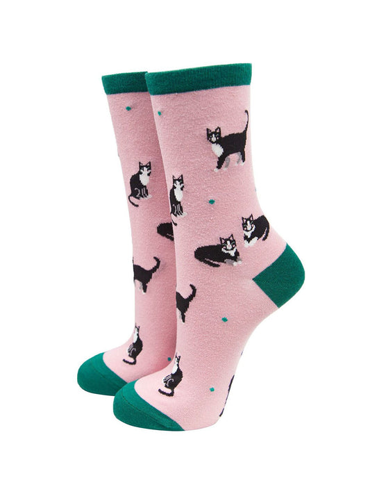 pink and green ankle socks with black cats on them