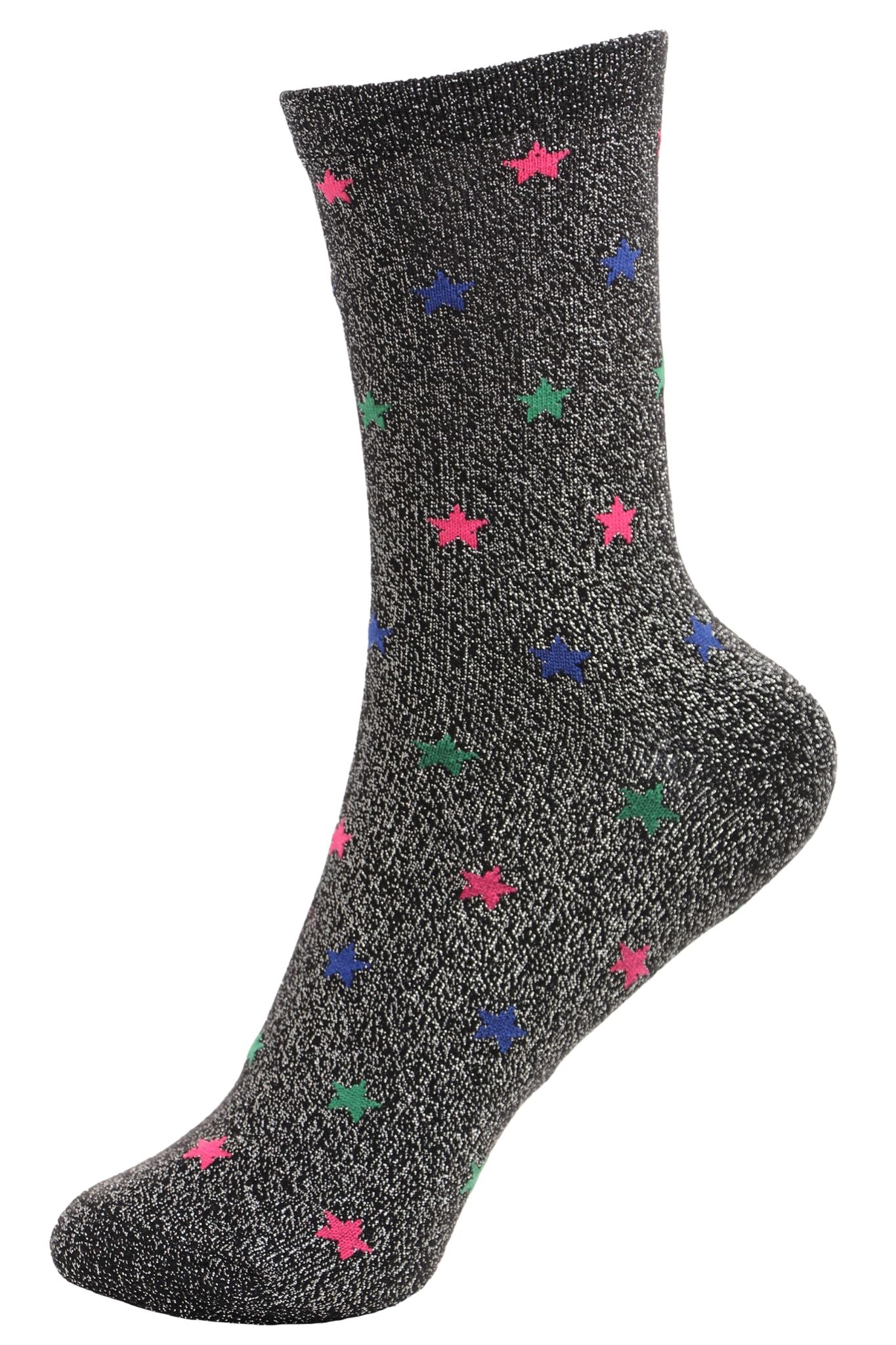 black glitter socks with a pink,green and blue star print pattern