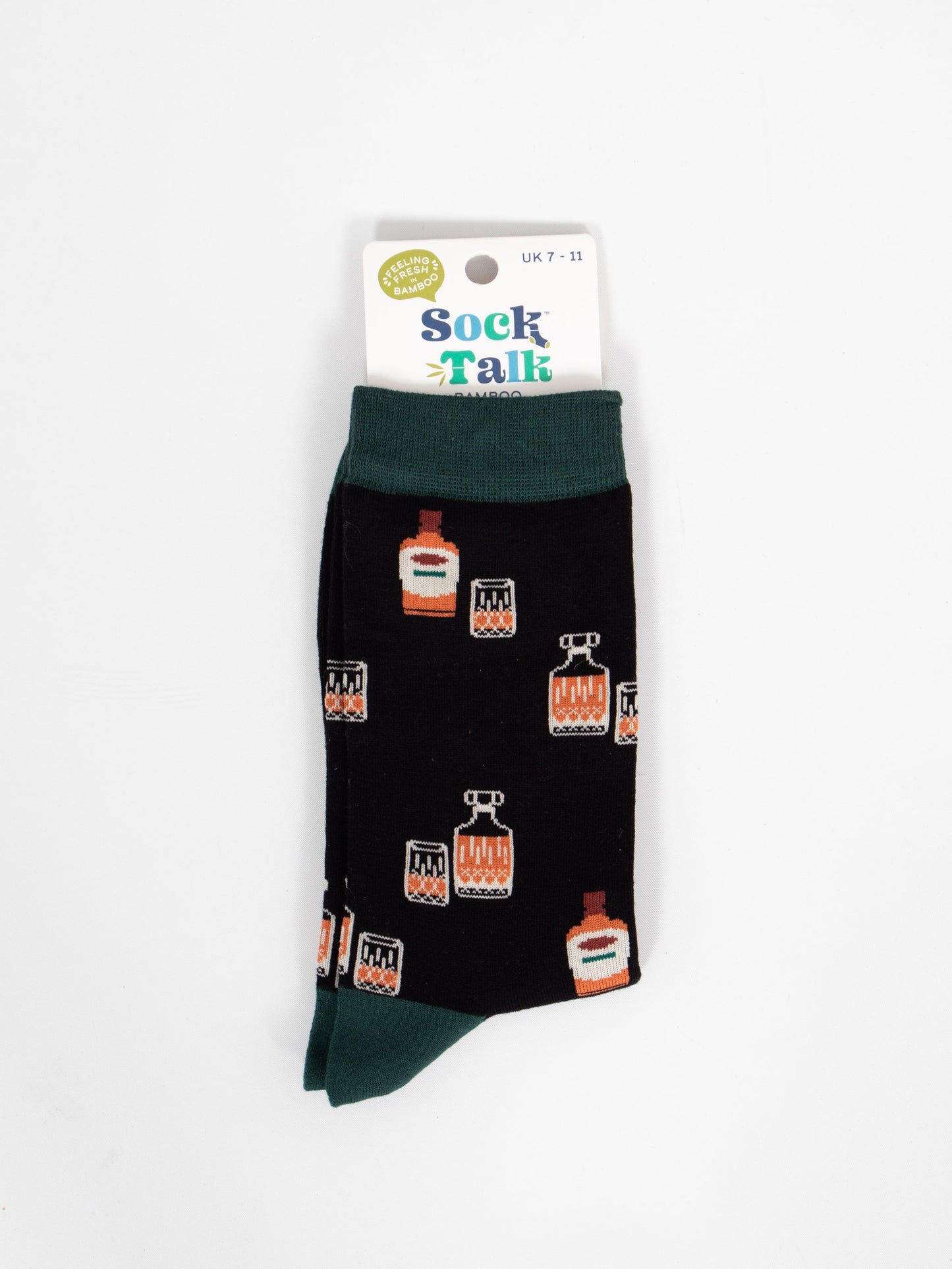 black bamboo dress socks featuring whisky glasses and decanters