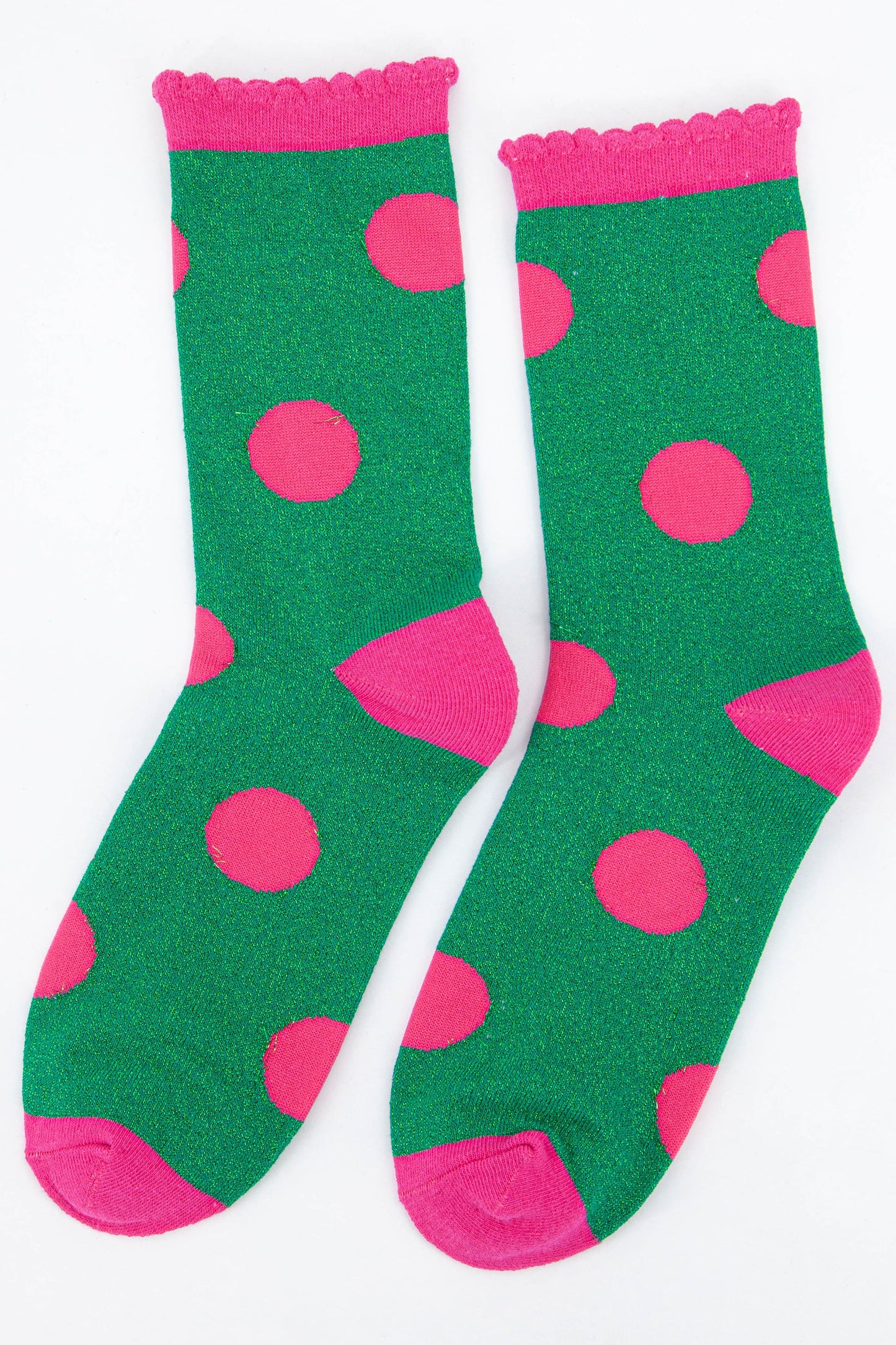green and pink glitter ankle socks with a large scattered polka dot spot pattern