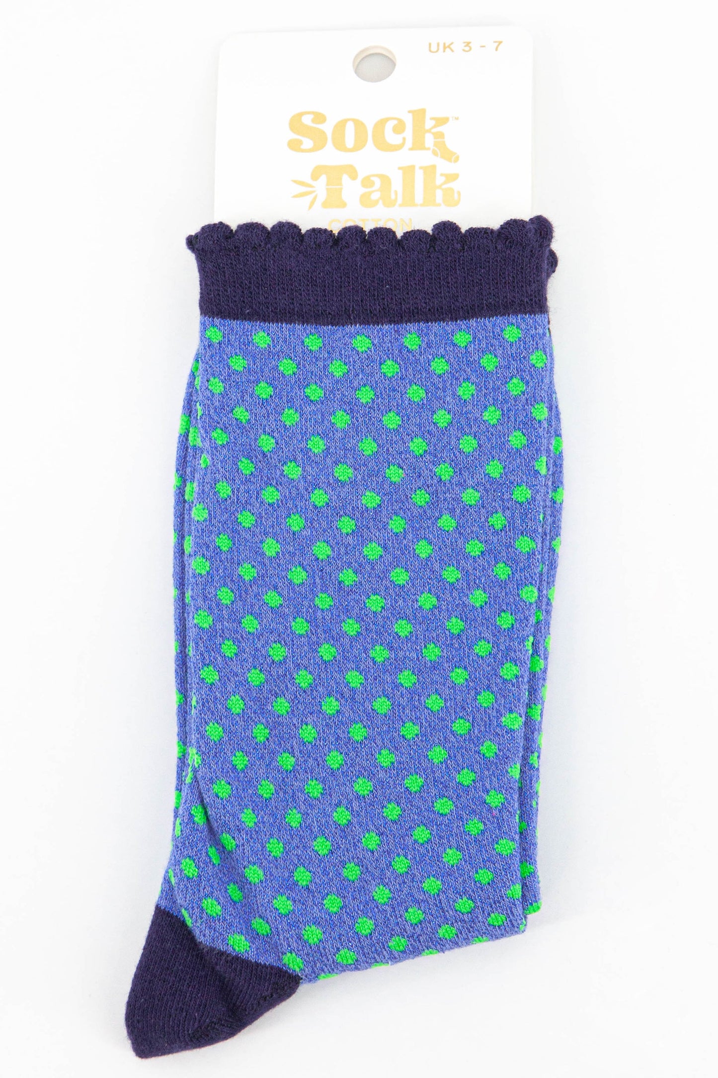 blue glitter socks with an all over green polka dot pattern uk size 3-7