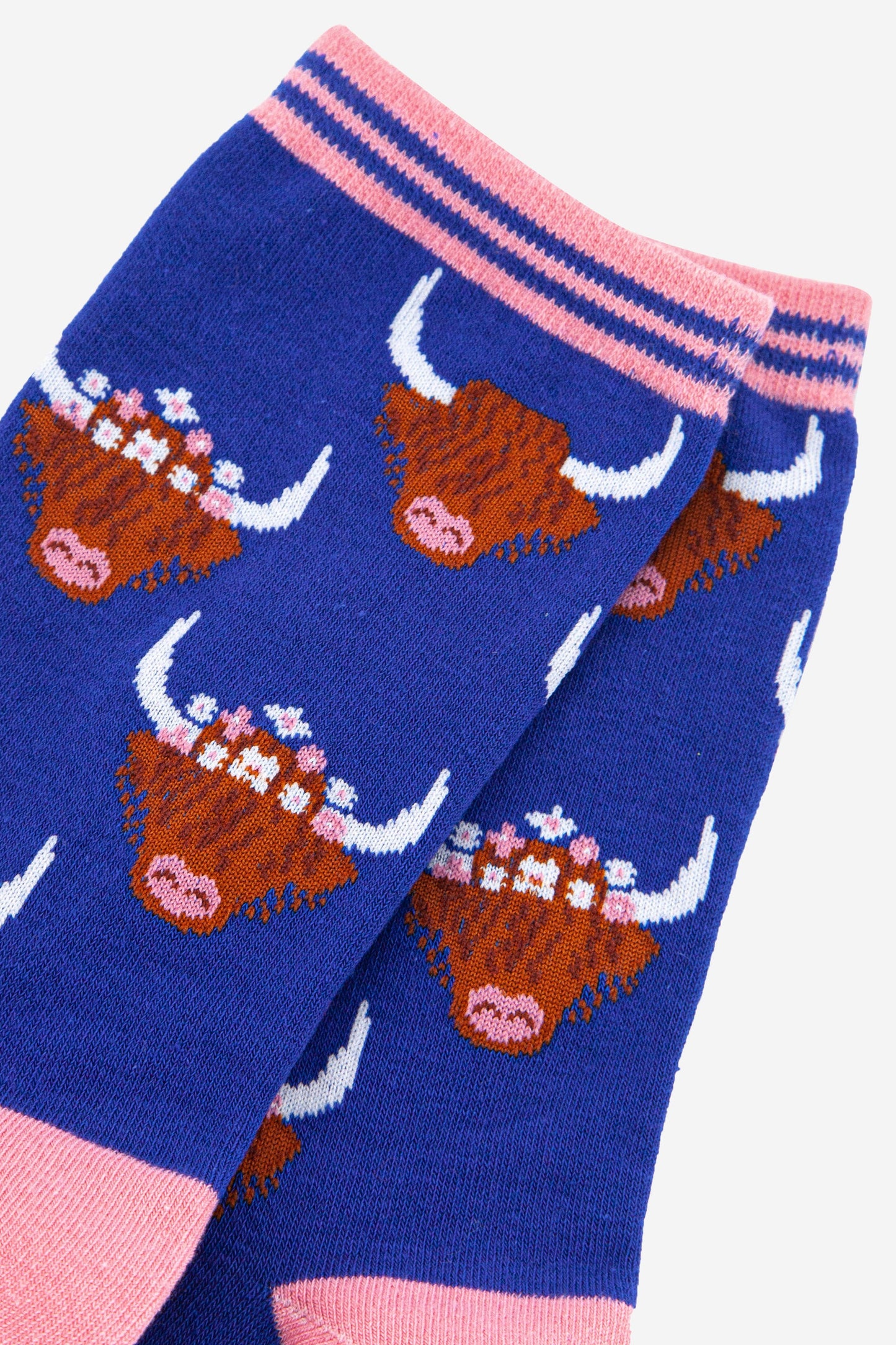 close up of the scottish highland cow pattten showing the floral crown detail