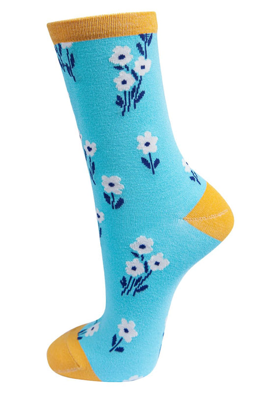 blue and yellow bamboo ankle socks with an all over white ditsy floral print