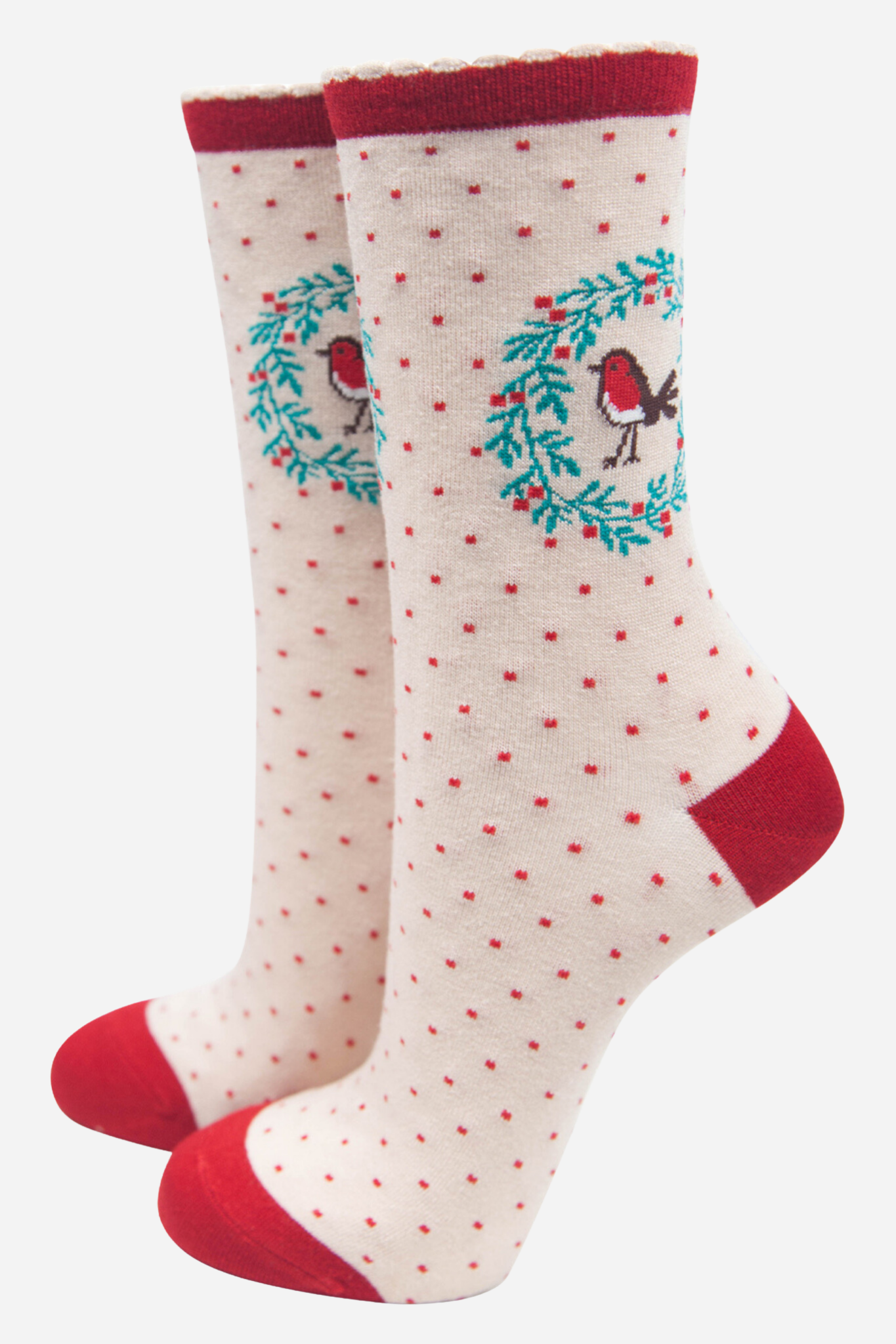 cream bamboo socks with red heel, toe and cuff with a holly wreath and red robin bird on the ankle