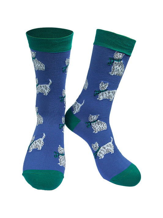 blue socks with a green heel, toe and cuff with an all over pattern of white scottie dogs