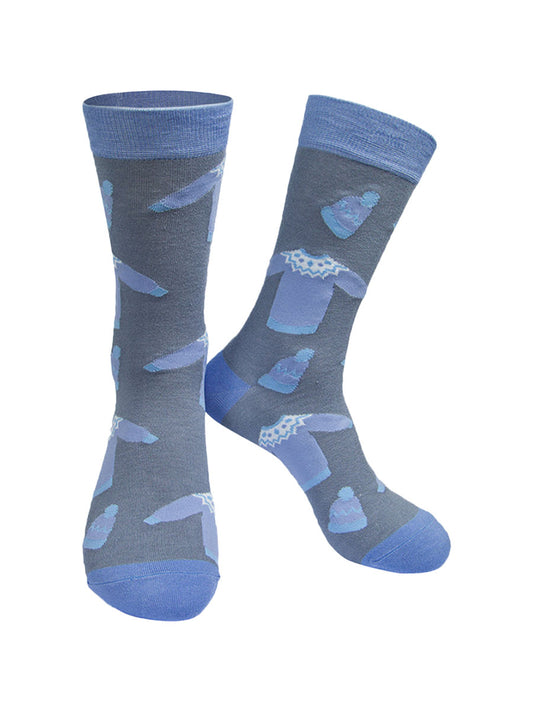 grey socks with light blue heel, toe and cuff with a pattern of christmas jumpers and knitted hats