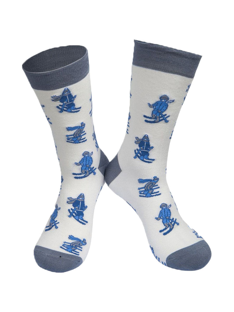 white, grey and blue bamboo dress socks with cartoon skiers on them