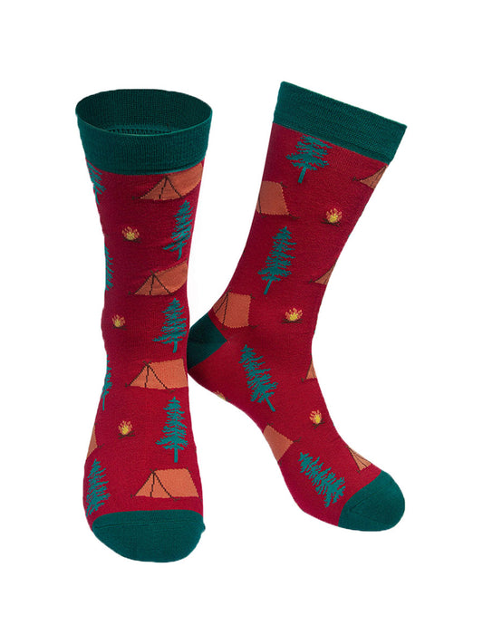 red and green bamboo socks with a pattern of tents, campfires and tress all over