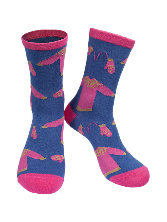 blue and pink bamboo socks featuring a christmas sweater and hat pattern