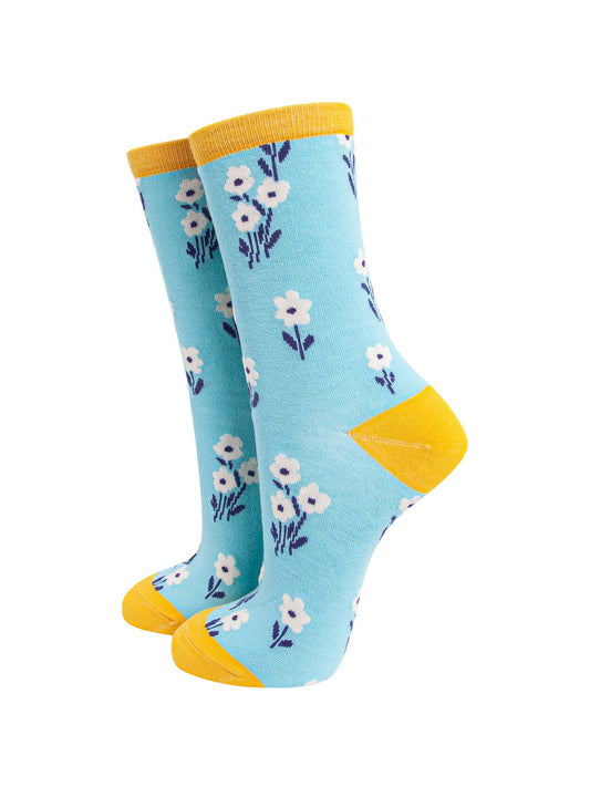 blue and yellow bamboo ankle socks with an all over white ditsy floral print