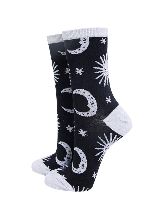 black socks with grey, stars, crescent moons and suns with silver sparkly glitter accents