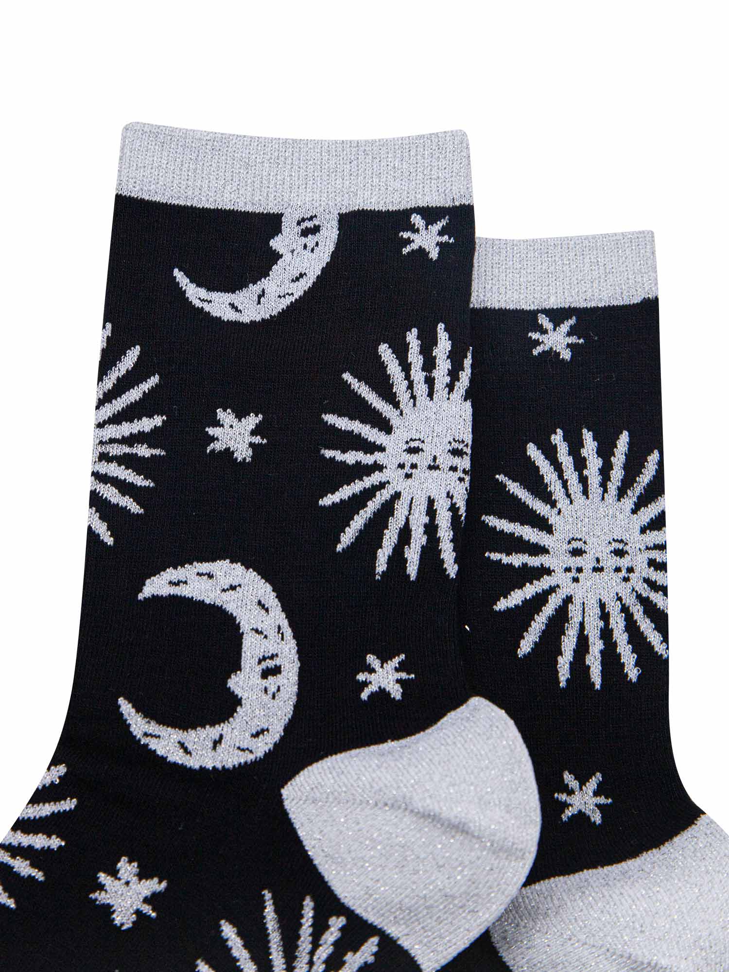 close up, showing the silver glitter heel, toe, cuff and sparkles on the celestial patterns