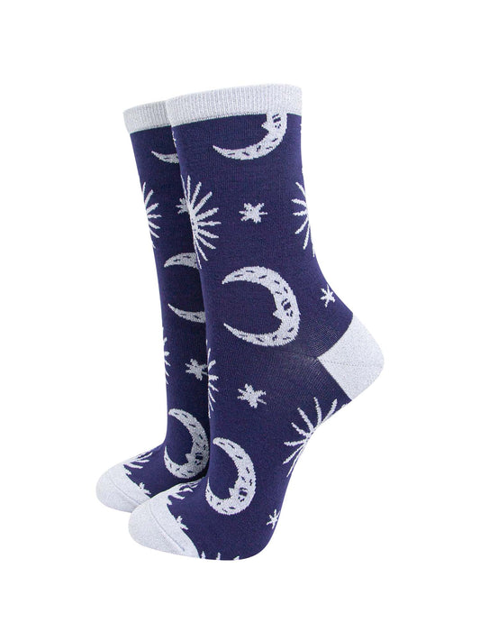 blue socks with grey, stars, crescent moons and suns with silver sparkly glitter accents