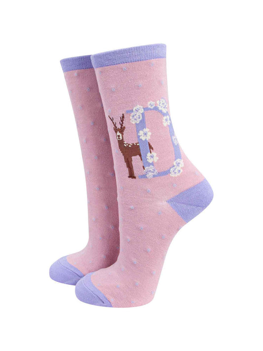 pink, lilac bamboo socks with a letter D and a deer