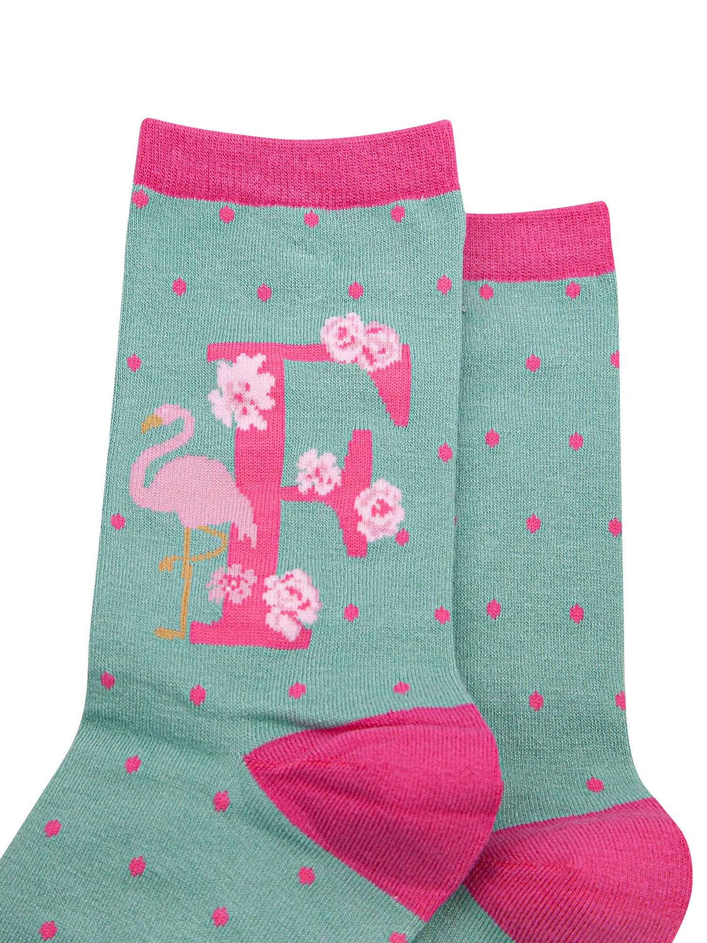 green, pink bamboo socks with the initial F
