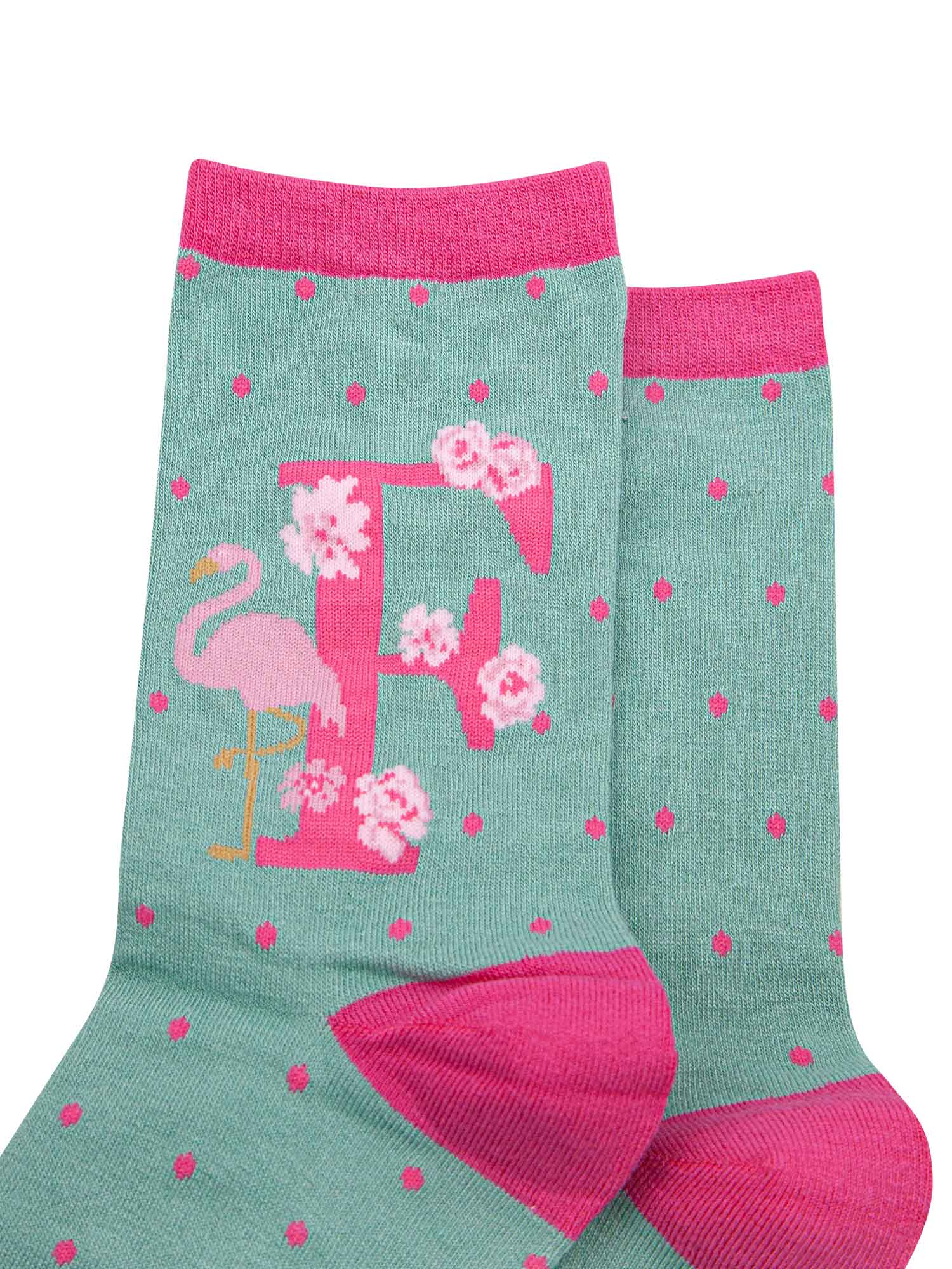 green, pink bamboo socks with the initial F
