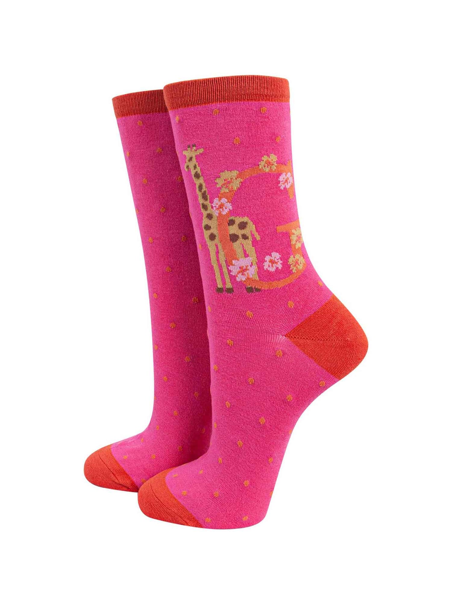 pink, orange ankle socks with the letter G and a giraffe
