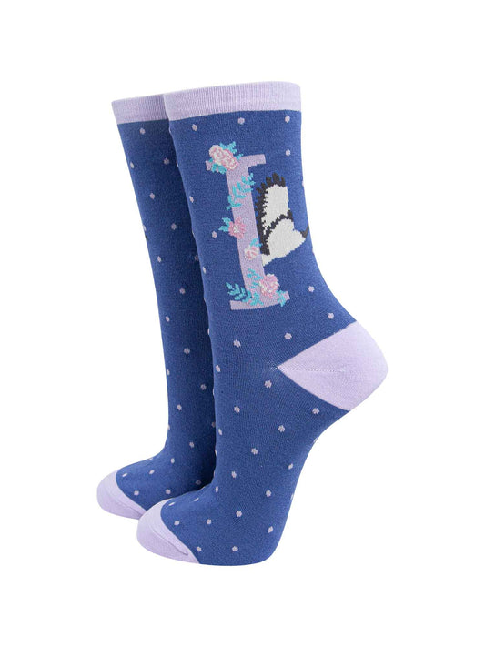 blue, lilac ankle socks with the letter I and an Ibis bird