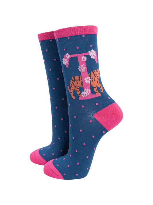 blue, pink ankle socks with a letter T and a tiger