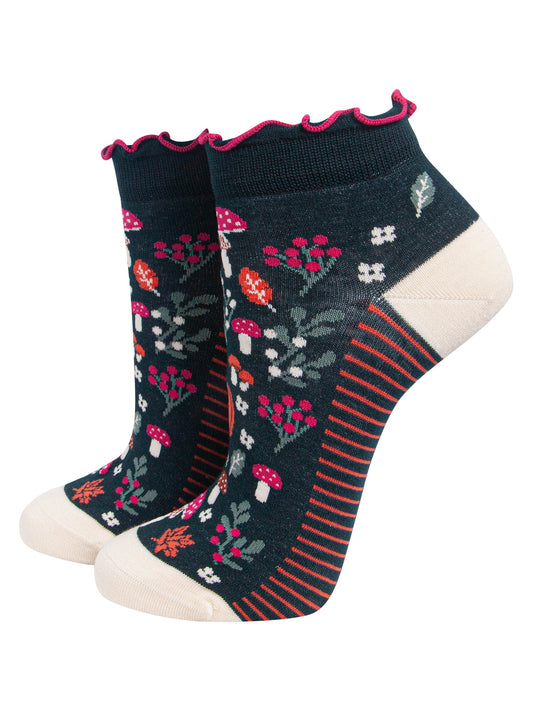 Pumpkin-Floral-Women's-Bamboo-Trainer-Socks-in-Dark-Green-On-Mannequin