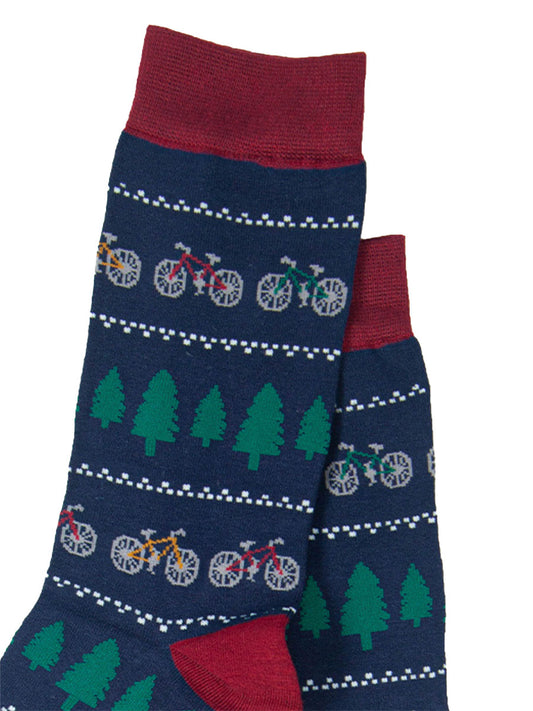 close up of the fair isle style print with trees and bicycles