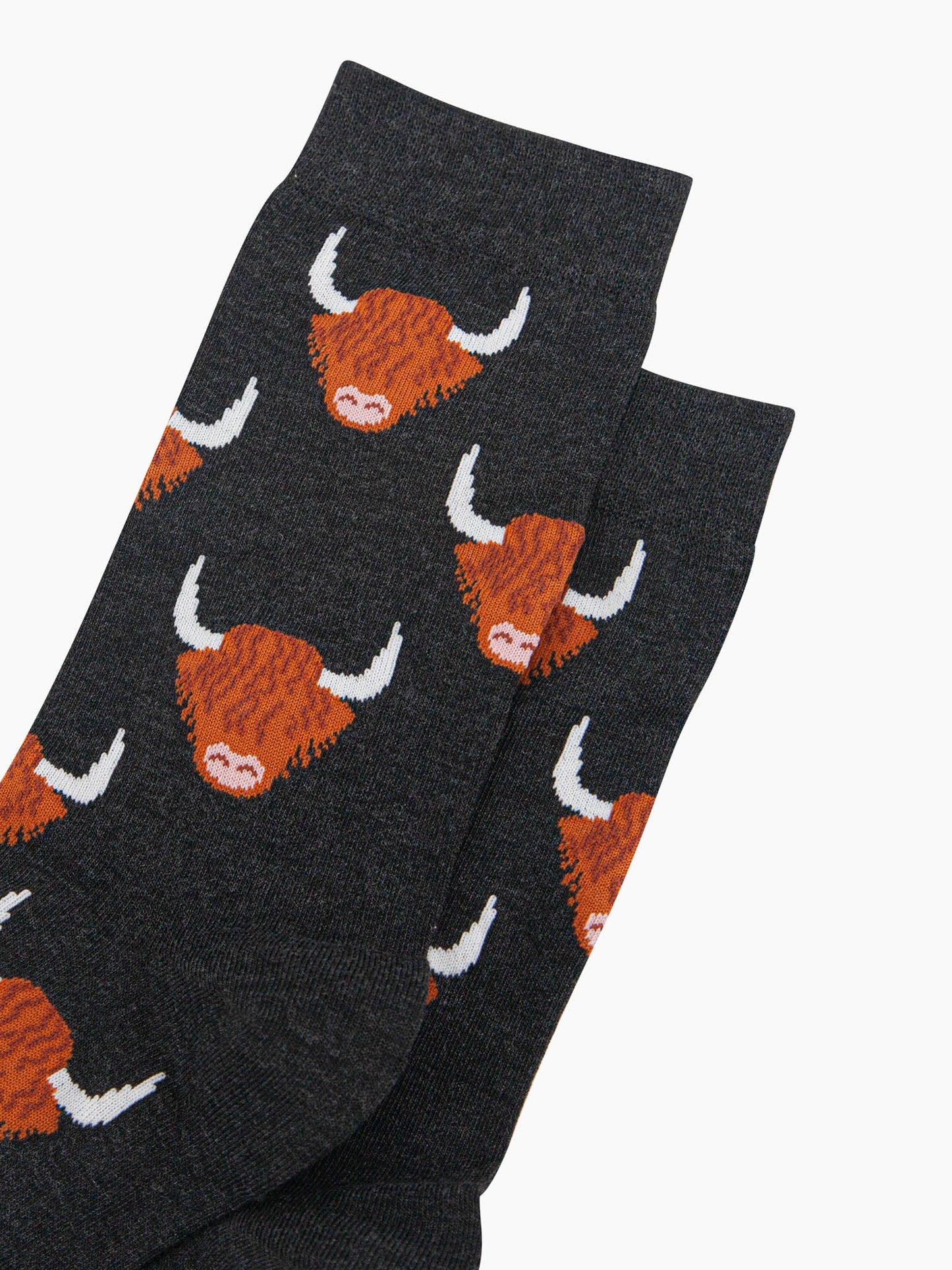 mens-bamboo-socks-black-highland-cow-close-up-orange-brown-scottish-coos