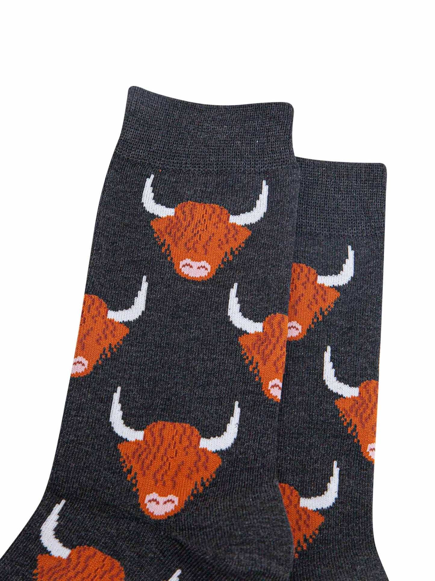 mens-bamboo-socks-black-highland-cow-close-up-orange-brown-scottish-coos