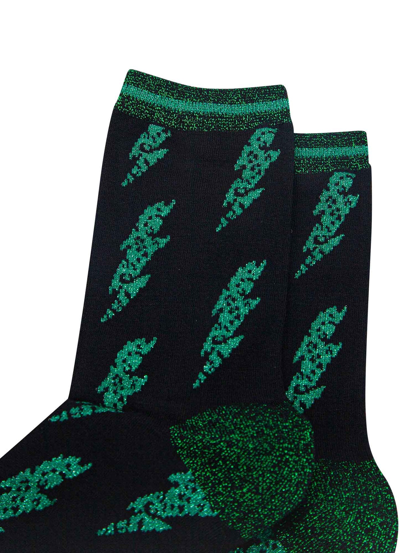 close up of green lightning bolts and glitter trim