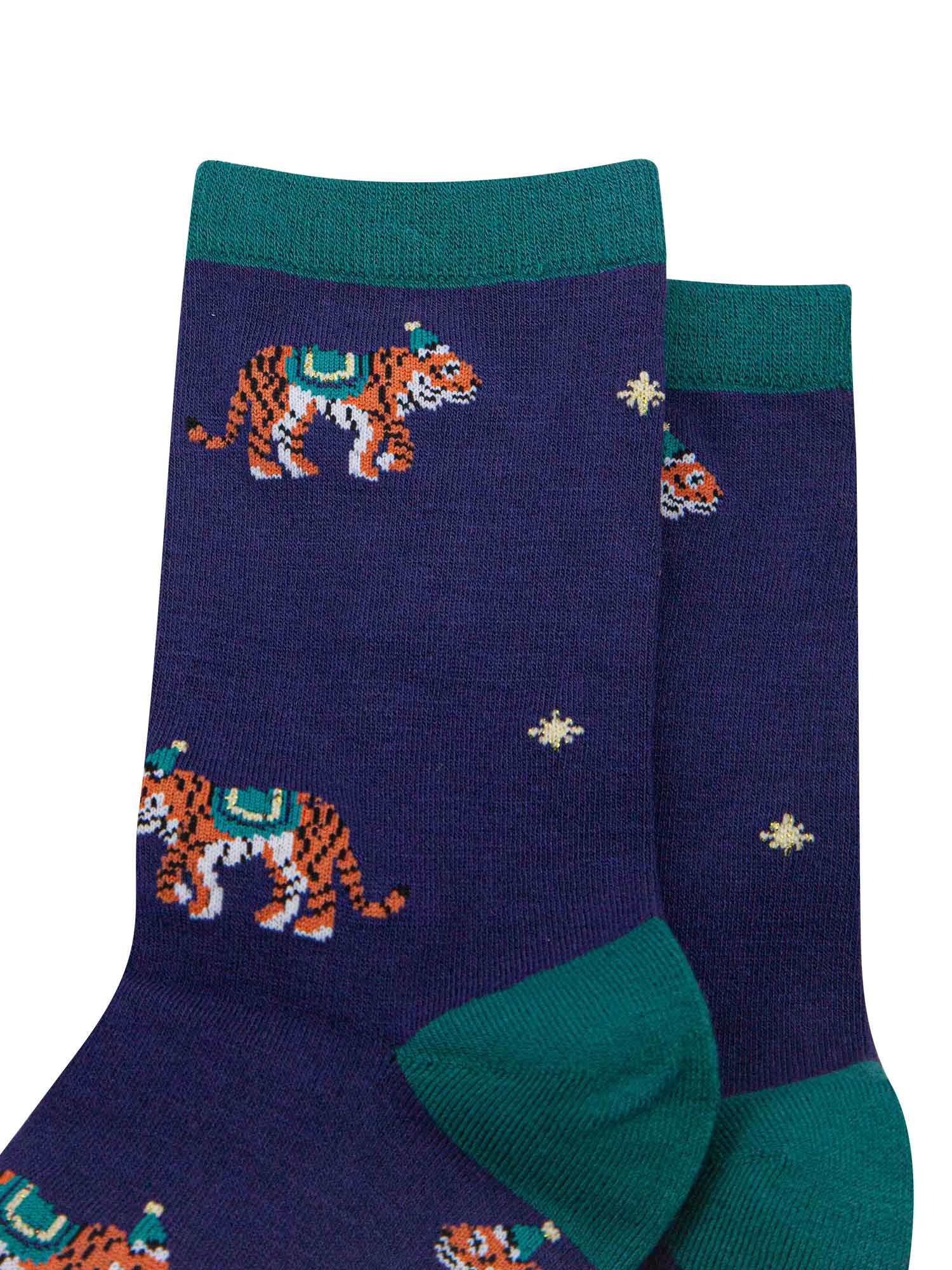 navy blue ankle socks with tigers all over, tigers are wearing party hats

