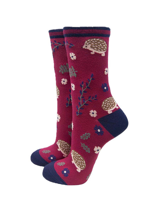 deep pink and navy blue ankle socks with hedgehogs and a floral print