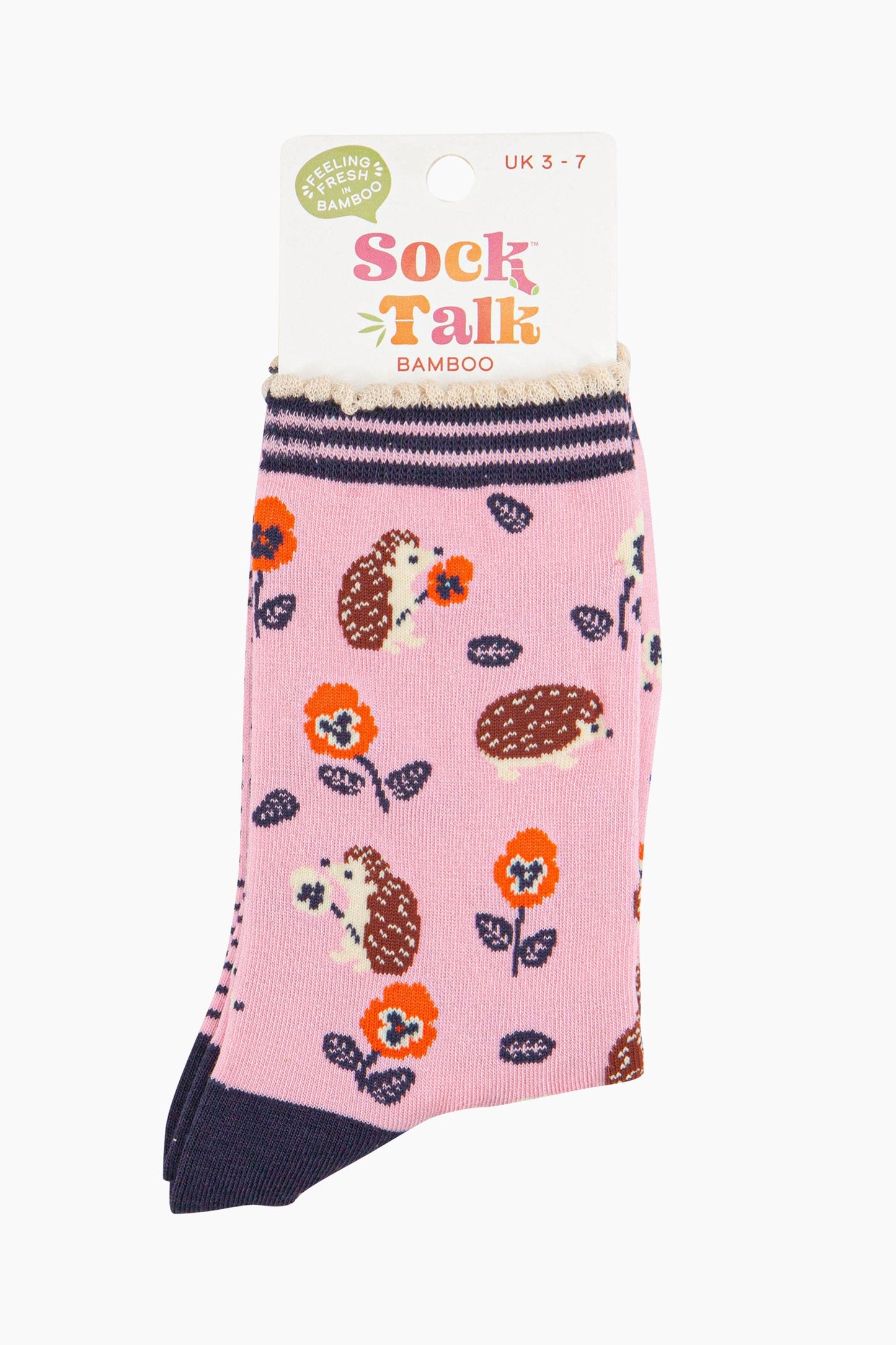 women's pink hedgehog and pansy flower ankle socks in their sock talk packaging, the socks are a uk size 3-7.