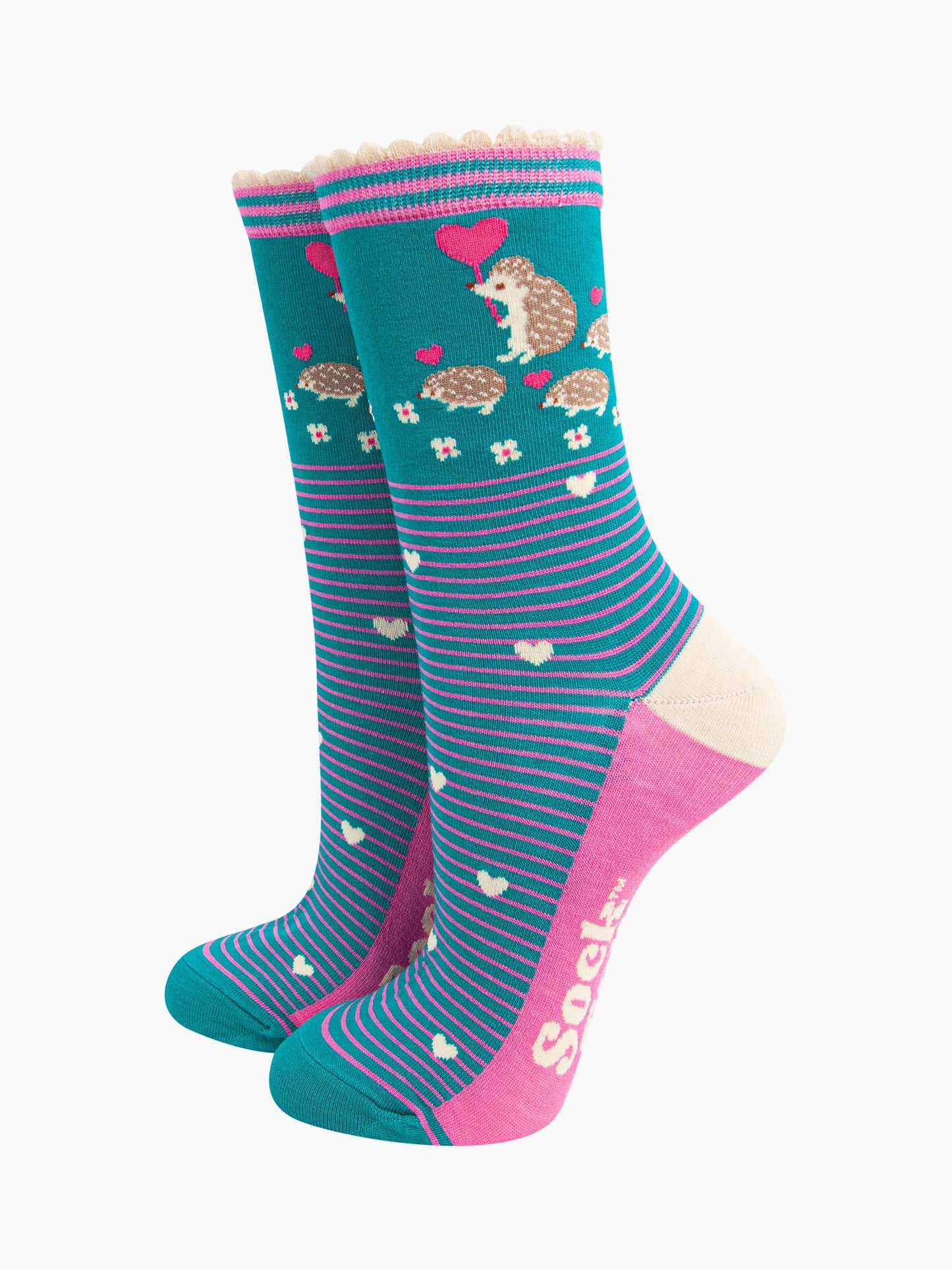 teal bamboo socks with pink horizontal pinstripes. on the ankle of the socks there is an adult hedgehog with three baby hedgehogs each carrying pink love heart shaped balloons.