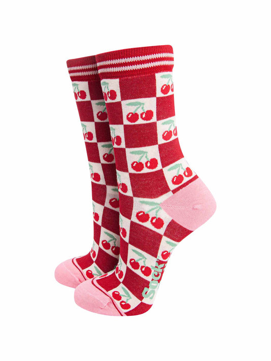 womens-bamboo-socks-cream-red-cherry-squares-socks-standing-upright-the-checked-pattern-is red-and-cream-the-cream-squares-feature-red-cherries