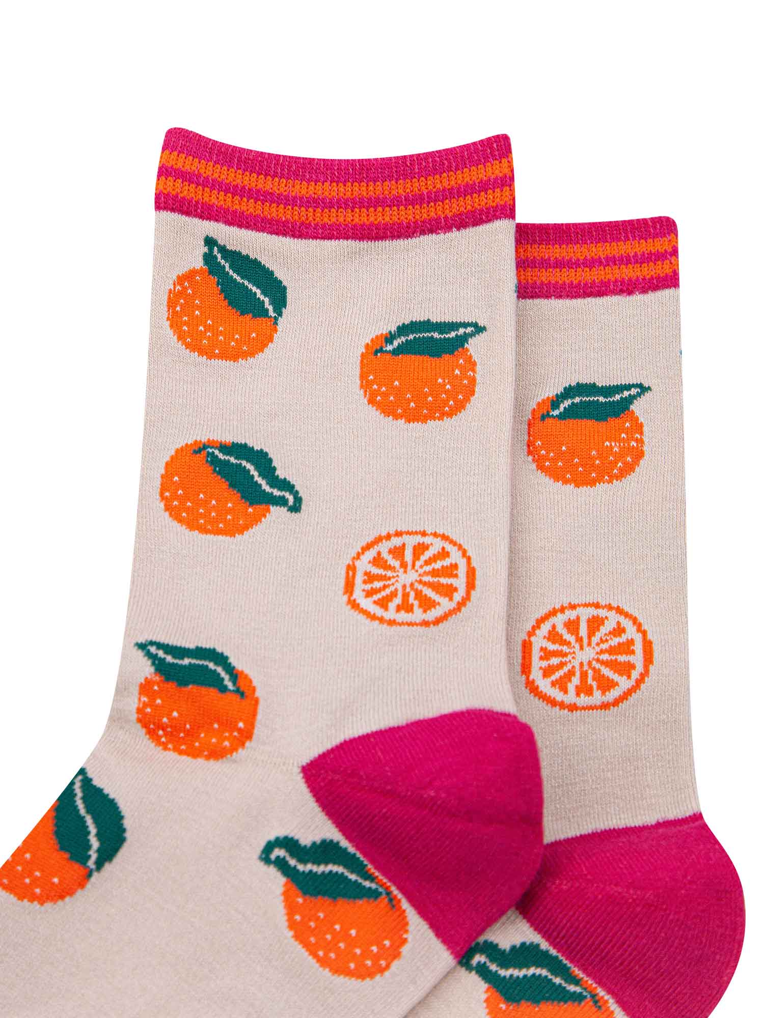 close up of the orange fruit pattern on the socks and a close up of the striped cuff
