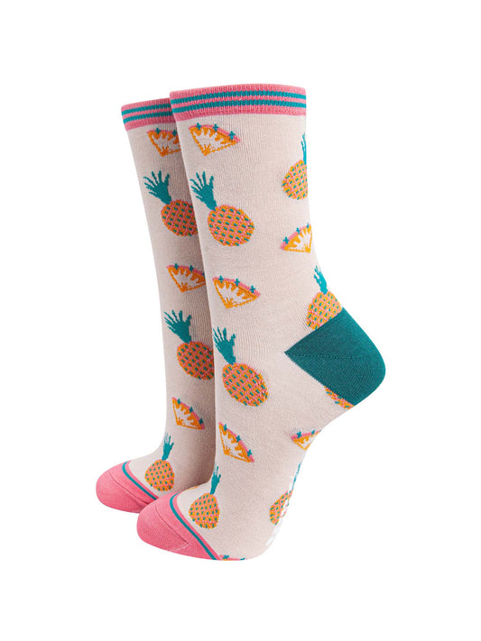 cream and pink bamboo socks with an all over pineapple fruit print pattern and striped cuff