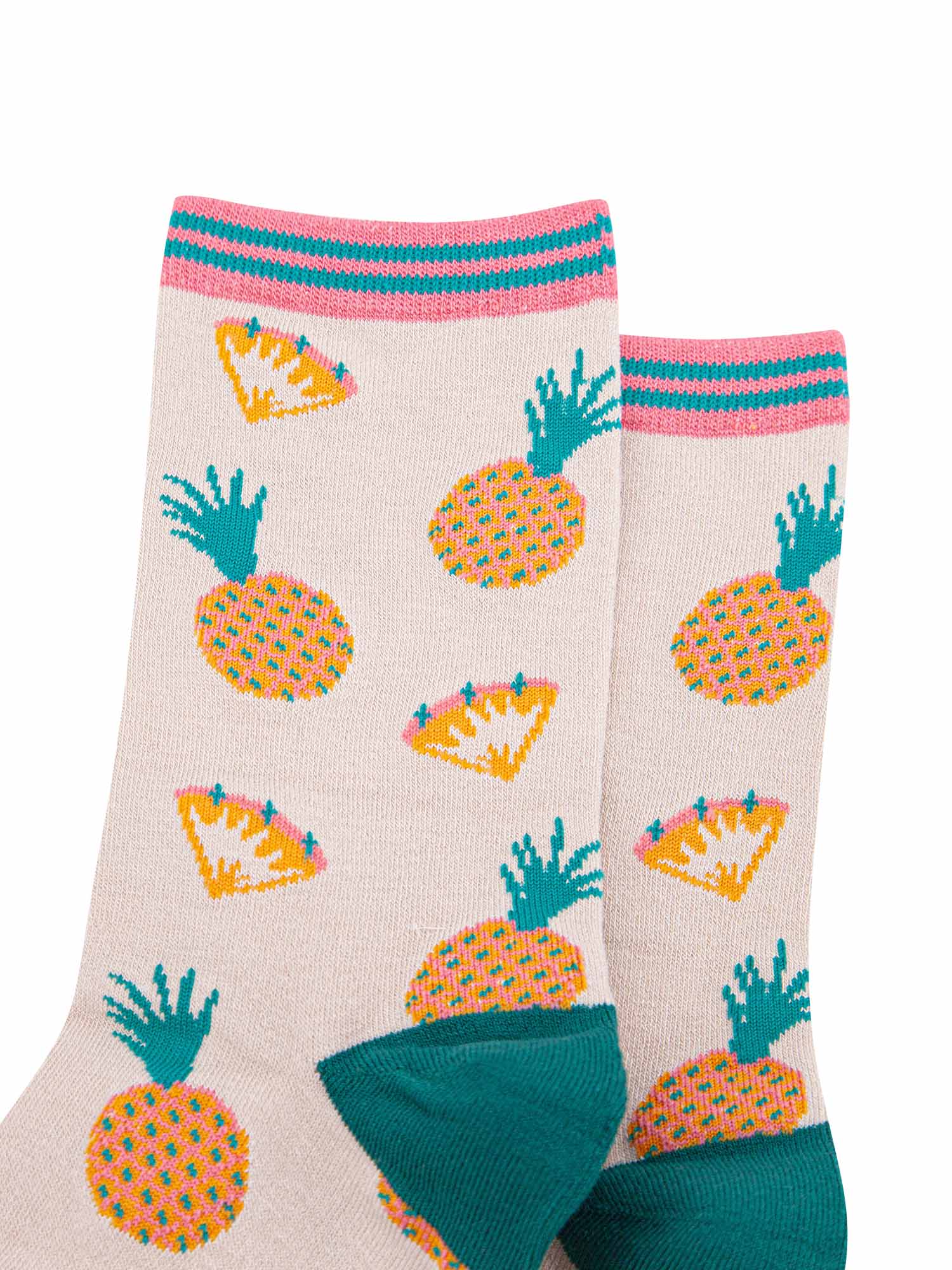 close up of the pineapple and pineapple slice pattern on the ankle socks